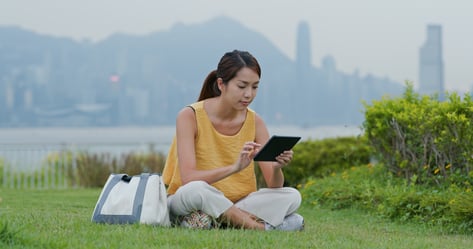 woman-read-on-ebook-at-park-2021-08-30-06-38-21-utc